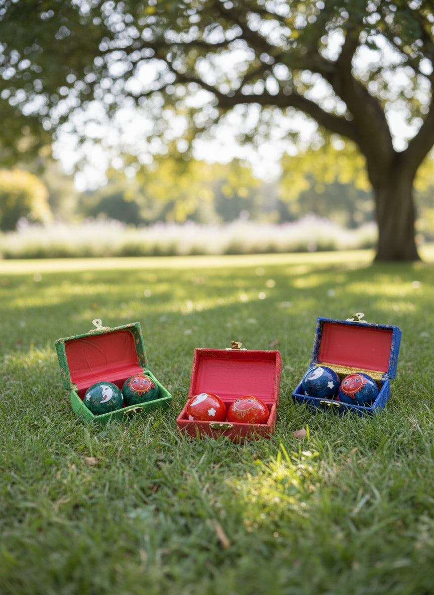 red, green and blue sun moon baoding balls in a mindful stress free background